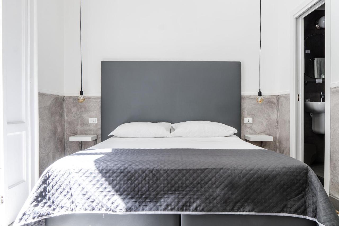 Toledostop Naples Exterior photo A bedroom